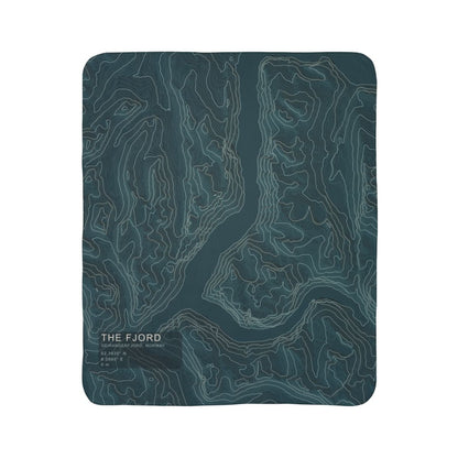 The Fjord Geirangerfjord topographic fleece blanket shown flat in deep teal