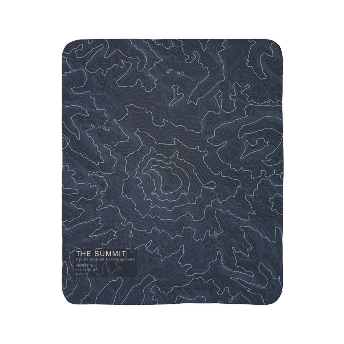 The Summit Mount Rainier topographic fleece blanket shown flat in navy